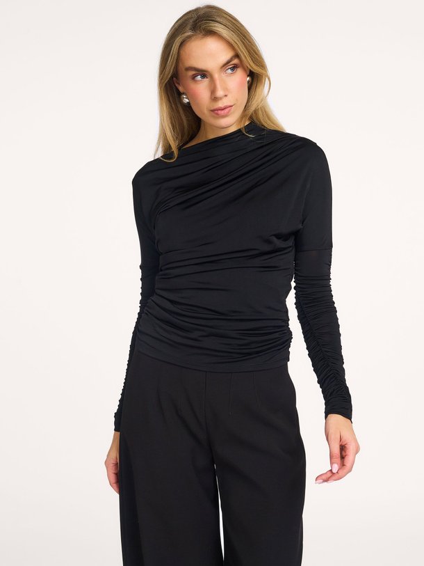 Ontdek de Viscosemix geplooide top van Ganni in de kleur zwart bij Orangebag. Op werkdagen voor 21:45 besteld, morgen in huis.