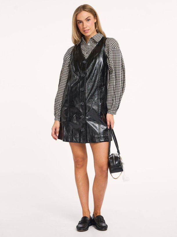 Ontdek de Katoenmix leatherlook doorknoopjurk van Frnch in de kleur zwart bij Orangebag. Op werkdagen voor 21:45 besteld, morgen in huis.