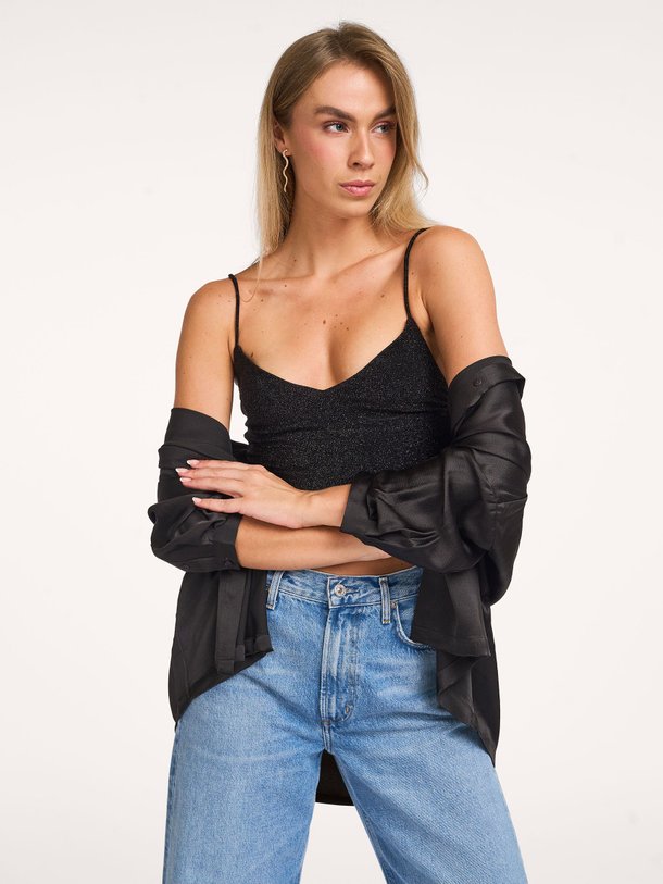 Ontdek de Roberto jersey top met lurex van Karma Koma in de kleur zwart bij Orangebag. Op werkdagen voor 21:45 besteld, morgen in huis.