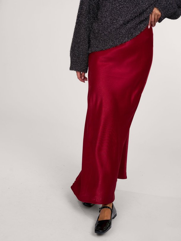 Ontdek de Estelle viscosemix rok van My Essential Wardrobe in de kleur bordeauxrood bij Orangebag. Op werkdagen voor 21:45 besteld, morgen in huis.