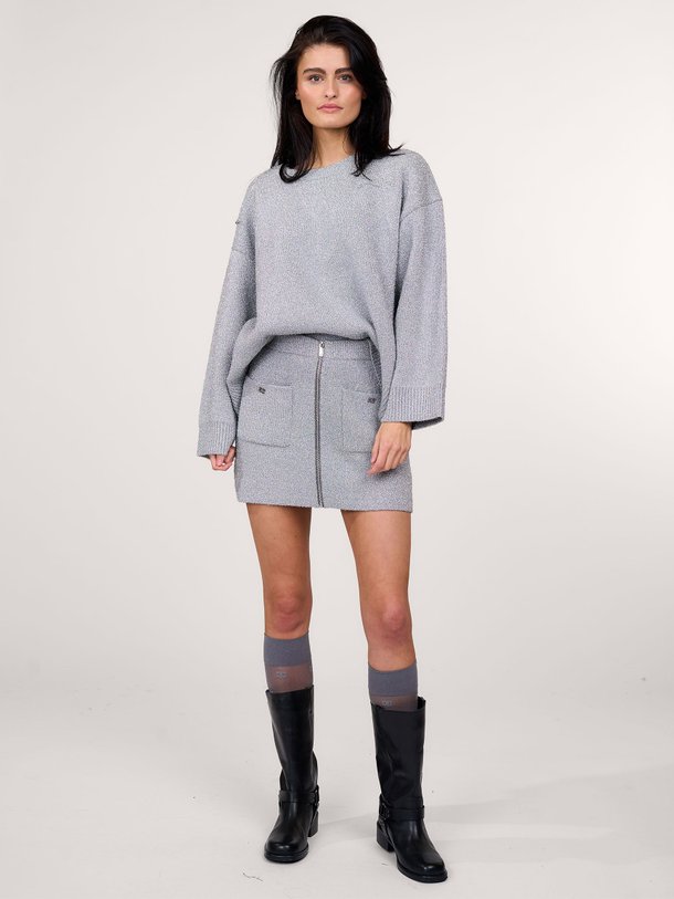 Ontdek de Wolmix mini rok met lurex van Ganni in de kleur zilverkleur bij Orangebag. Op werkdagen voor 21:45 besteld, morgen in huis.