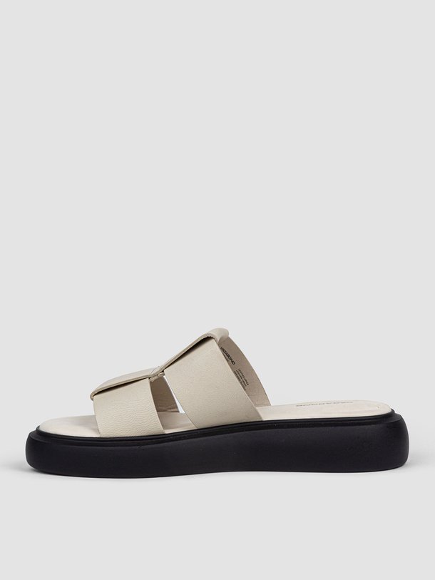 Ontdek de Blenda lederen slippers van Vagabond Shoemakers in de kleur off-white bij Orangebag. Op werkdagen voor 21:45 besteld, morgen in huis.