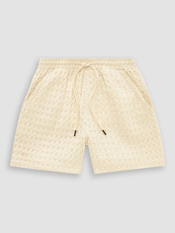 Ontdek de Porto katoenen short met wafel structuur van OAS in de kleur ecru bij Orangebag. Op werkdagen voor 21:45 besteld, morgen in huis.
