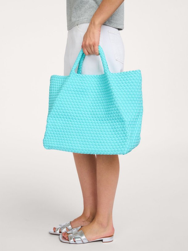 Ontdek de Gevlochten handtas large van Marrea in de kleur Turquoise bij Orangebag. Op werkdagen voor 21:45 besteld, morgen in huis.