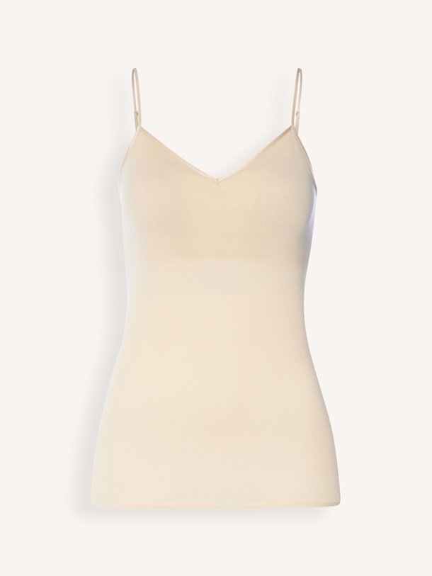 Ontdek de Katoenen voorgevormde top van Hanro in de kleur Zand bij Orangebag. Op werkdagen voor 21:45 besteld, morgen in huis.
