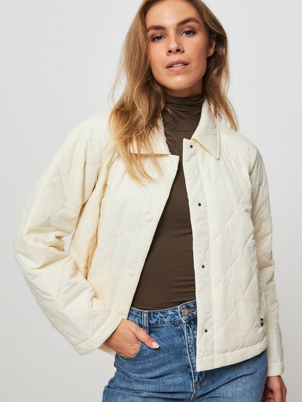 Ontdek de Gewatteerd jack van Tommy Hilfiger in de kleur ecru bij Orangebag. Op werkdagen voor 21:45 besteld, morgen in huis.