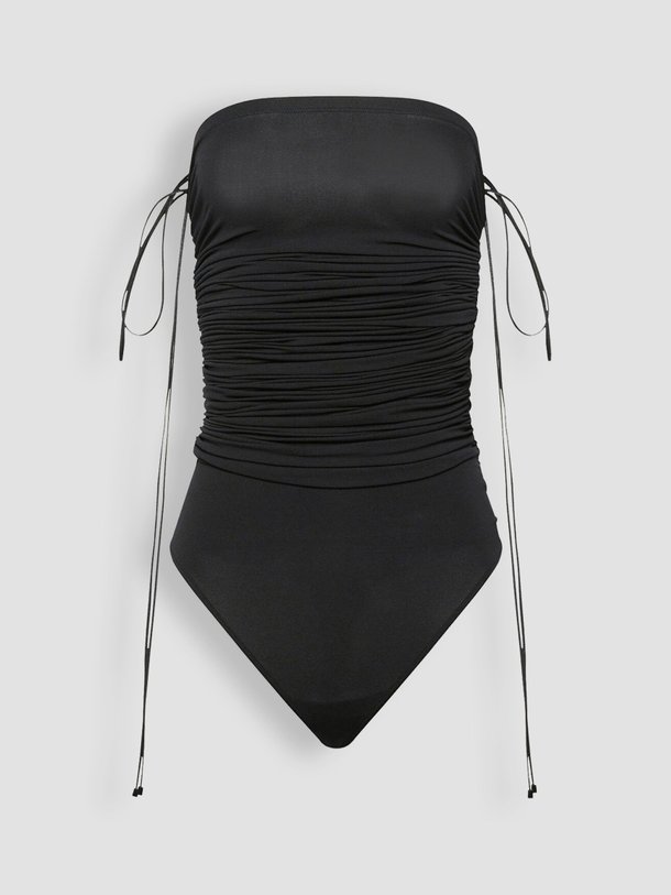 Ontdek de Fatal jersey string body van Wolford in de kleur zwart bij Orangebag. Op werkdagen voor 21:45 besteld, morgen in huis.