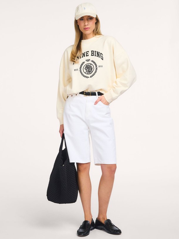 Ontdek de Miles katoenen sweater met print van Anine Bing in de kleur Crème bij Orangebag. Op werkdagen voor 21:45 besteld, morgen in huis.