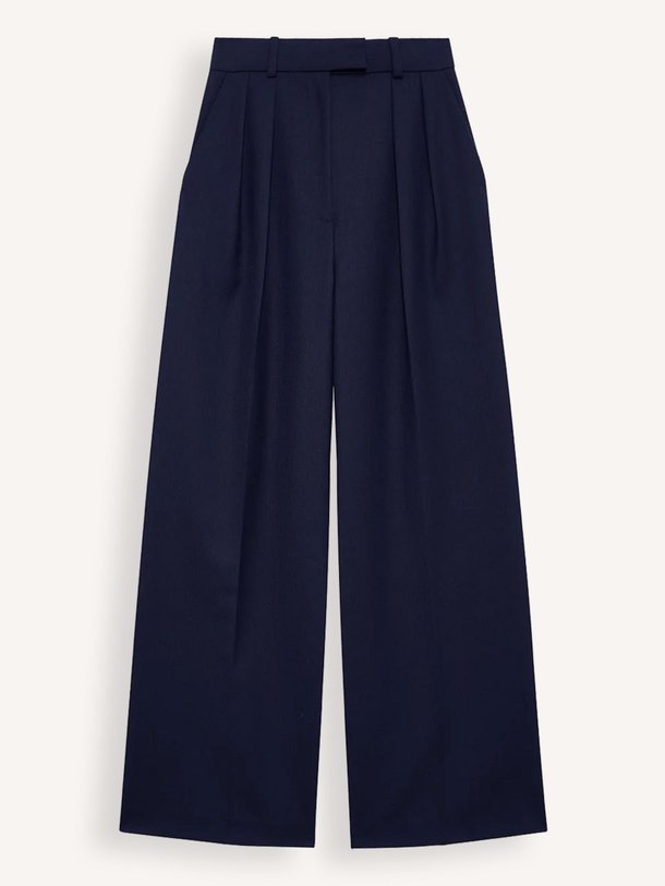Ontdek de Lou wolmix pantalon van Anine Bing in de kleur Donkerblauw bij Orangebag. Op werkdagen voor 21:45 besteld, morgen in huis.