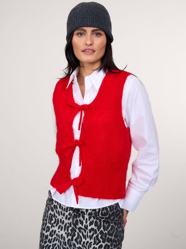 Ontdek de Mohairmix vest van Ganni in de kleur rood bij Orangebag. Op werkdagen voor 21:45 besteld, morgen in huis.