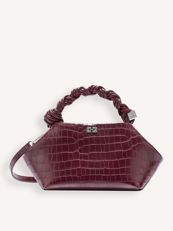 Ontdek de Bou small croco crossbody bag van Ganni in de kleur Bordeauxrood bij Orangebag. Op werkdagen voor 21:45 besteld, morgen in huis.