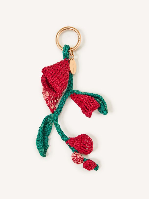 Ontdek de Clochette raffia bag charm van Vanessa Bruno in de kleur Rood bij Orangebag. Op werkdagen voor 21:45 besteld, morgen in huis.
