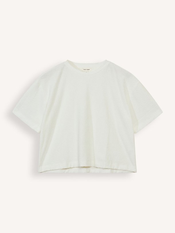 Ontdek de Bani katoenmix T-shirt van Club L`avenir in de kleur off-white bij Orangebag. Op werkdagen voor 21:45 besteld, morgen in huis.