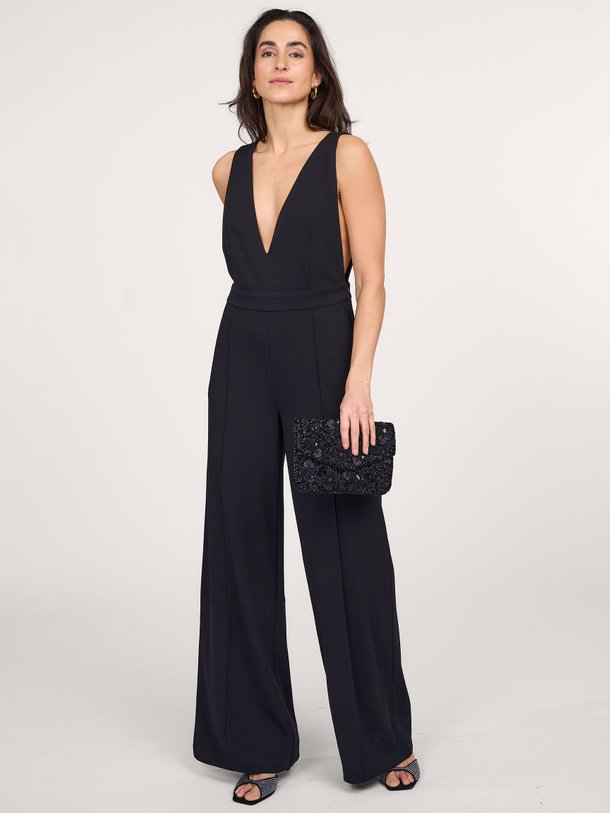 Ontdek de Falcon geweven jumpsuit van Co'Couture in de kleur zwart bij Orangebag. Op werkdagen voor 21:45 besteld, morgen in huis.
