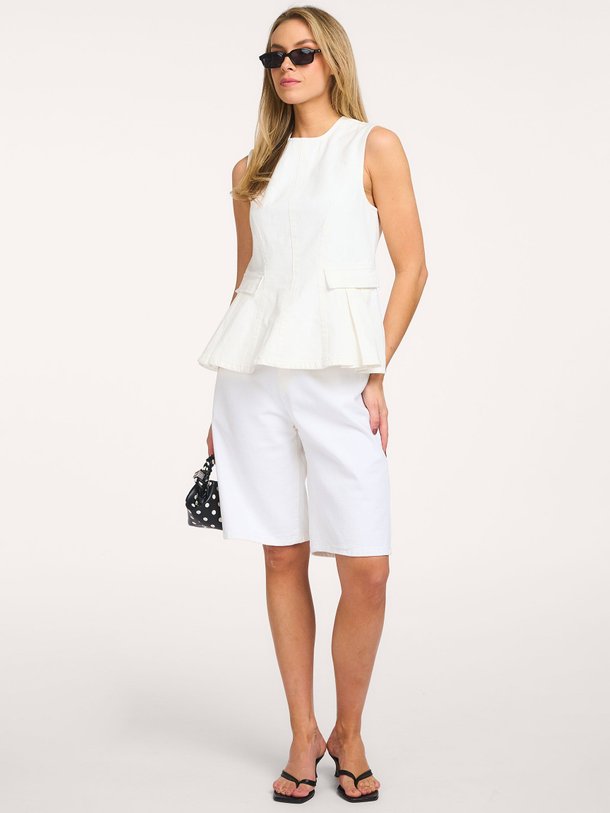 Ontdek de Liloua denim top van Rotate Birger Christensen in de kleur Off-white bij Orangebag. Op werkdagen voor 21:45 besteld, morgen in huis.