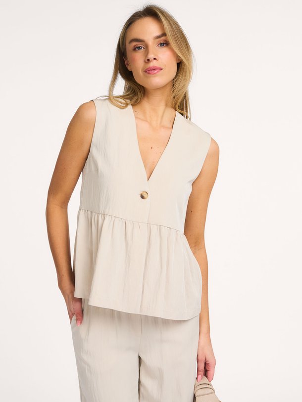 Ontdek de Agnete viscosemix gilet van Modstrom in de kleur Zand bij Orangebag. Op werkdagen voor 21:45 besteld, morgen in huis.