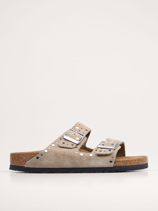 Ontdek de Arizona Rivet suède slippers van Birkenstock in de kleur taupe bij Orangebag. Op werkdagen voor 21:45 besteld, morgen in huis.