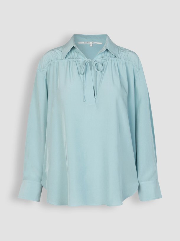 Ontdek de Cibelle viscose top van Second Female in de kleur lichtblauw bij Orangebag. Op werkdagen voor 21:45 besteld, morgen in huis.