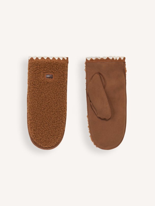 Ontdek de Lederen teddy wanten van Ugg in de kleur cognac bij Orangebag. Op werkdagen voor 21:45 besteld, morgen in huis.