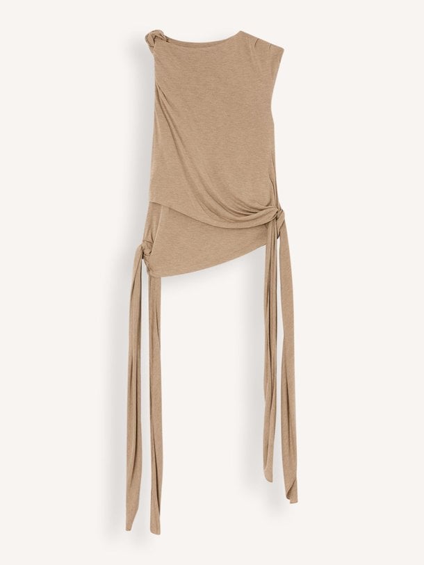 Ontdek de Viscose top van Ganni in de kleur Lichtbruin bij Orangebag. Op werkdagen voor 21:45 besteld, morgen in huis.