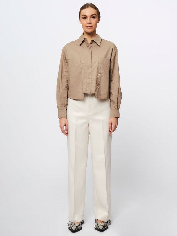 Ontdek de Shine geweven wide leg pantalon van Copenhagen Muse in de kleur crème bij Orangebag. Op werkdagen voor 21:45 besteld, morgen in huis.