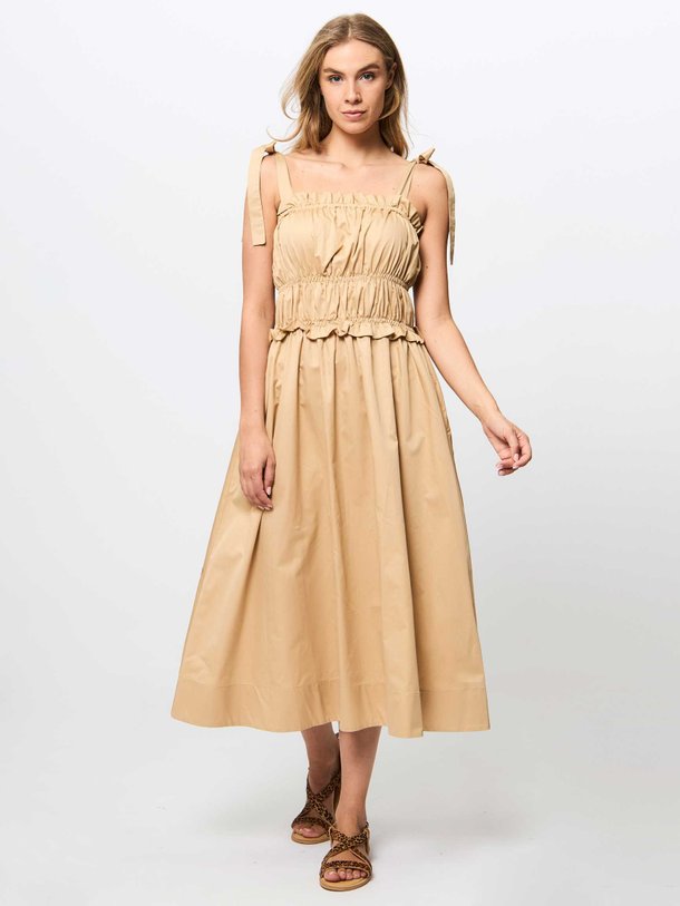 Ontdek de Rea katoenen jurk van Devotion in de kleur zand bij Orangebag. Op werkdagen voor 21:45 besteld, morgen in huis.