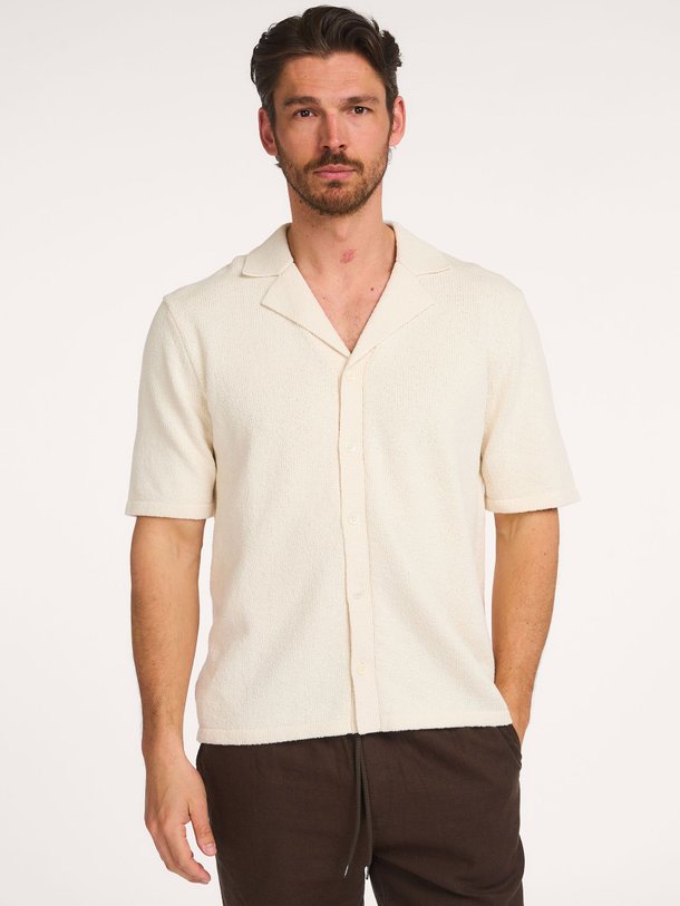 Ontdek de Katoenmix polo van Profuomo in de kleur Off-white bij Orangebag. Op werkdagen voor 21:45 besteld, morgen in huis.