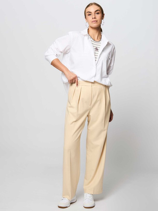 Ontdek de Viscosemix pantalon van Tommy Hilfiger in de kleur ecru bij Orangebag. Op werkdagen voor 21:45 besteld, morgen in huis.