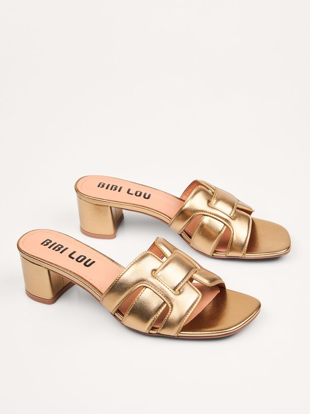 Ontdek de Holly lederen metallic muiltjes van Bibi Lou in de kleur Brons bij Orangebag. Op werkdagen voor 21:45 besteld, morgen in huis.