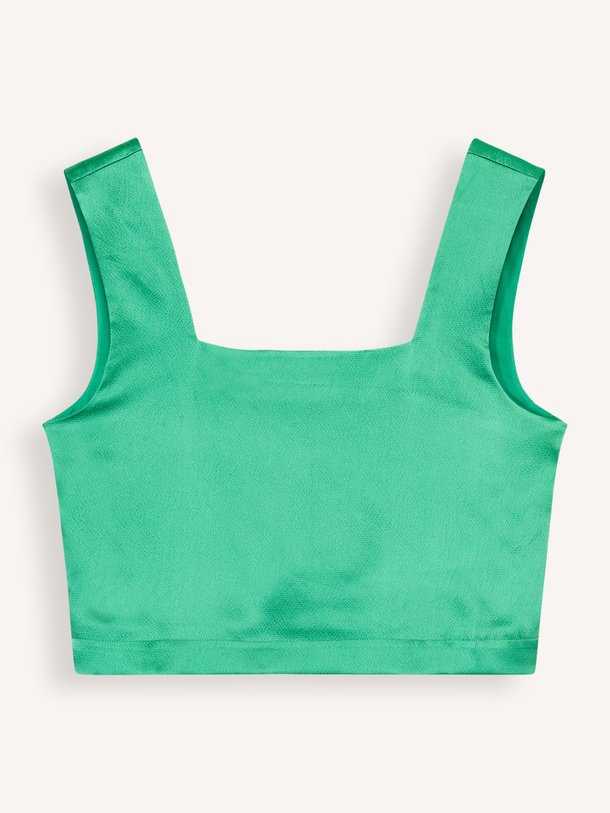 Ontdek de Texas zijden top van Karma Koma in de kleur groen bij Orangebag. Op werkdagen voor 21:45 besteld, morgen in huis.