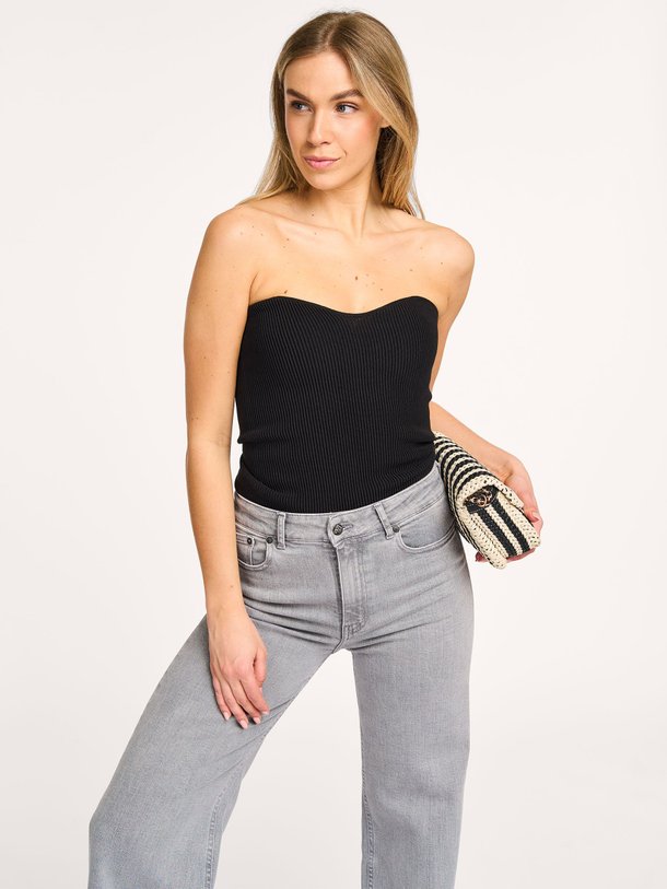 Ontdek de Yev viscosemix strapless top van Club L`avenir in de kleur zwart bij Orangebag. Op werkdagen voor 21:45 besteld, morgen in huis.