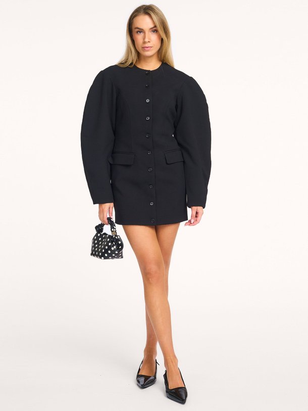 Ontdek de Vinetta geweven doorknoopjurk van Rotate Birger Christensen in de kleur Zwart bij Orangebag. Op werkdagen voor 21:45 besteld, morgen in huis.