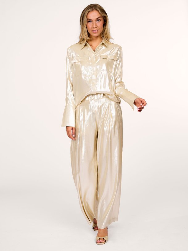Ontdek de Zijdemix glanzende broek van Semicouture in de kleur champagne bij Orangebag. Op werkdagen voor 21:45 besteld, morgen in huis.