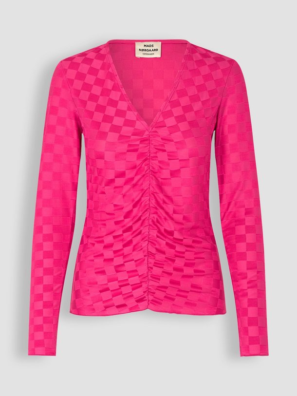 Ontdek de Shen elastische top met geruit dessin van Mads Norgaard in de kleur roze bij Orangebag. Op werkdagen voor 21:45 besteld, morgen in huis.