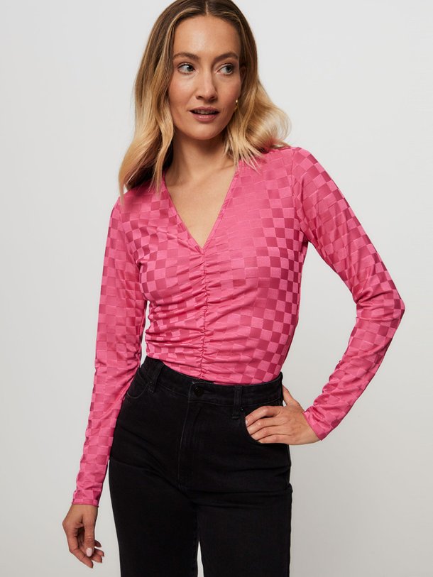 Ontdek de Shen elastische top met geruit dessin van Mads Norgaard in de kleur roze bij Orangebag. Op werkdagen voor 21:45 besteld, morgen in huis.