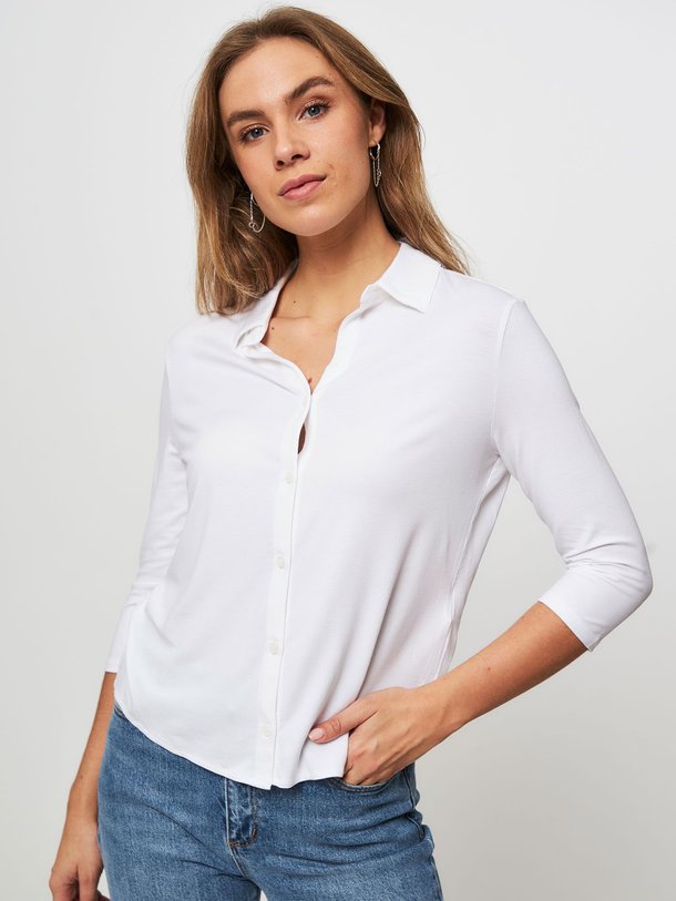 Ontdek de M001 Soft Touch viscosemix jersey blouse van Majestic Filatures in de kleur wit bij Orangebag. Op werkdagen voor 21:45 besteld, morgen in huis.