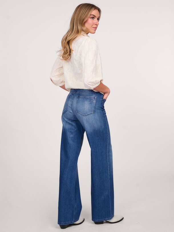 Ontdek de Nuit high waist wide leg coated jeans van Dante 6 in de kleur blauw bij Orangebag. Op werkdagen voor 21:45 besteld, morgen in huis.