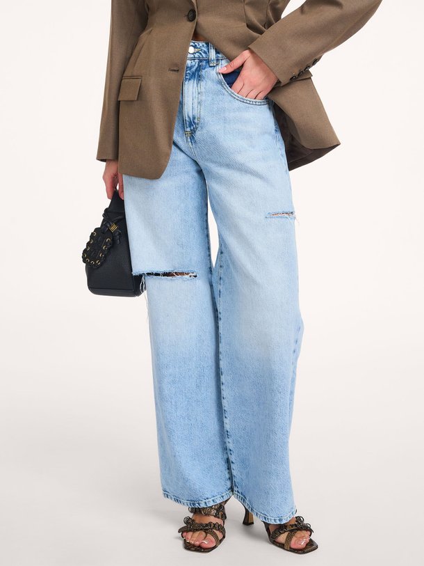 Ontdek de Poppy high waist wide leg destroyed jeans van Icon Denim in de kleur Blauw bij Orangebag. Op werkdagen voor 21:45 besteld, morgen in huis.