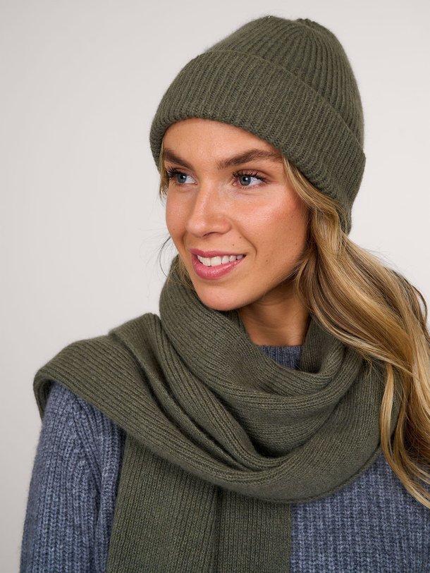 Ontdek de Wolmix beanie van Le Bonnet in de kleur donkergroen bij Orangebag. Op werkdagen voor 21:45 besteld, morgen in huis.