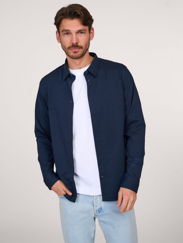 Ontdek de Elian organic cottonmix overhemd van NN.07 in de kleur donkerblauw bij Orangebag. Op werkdagen voor 21:45 besteld, morgen in huis.