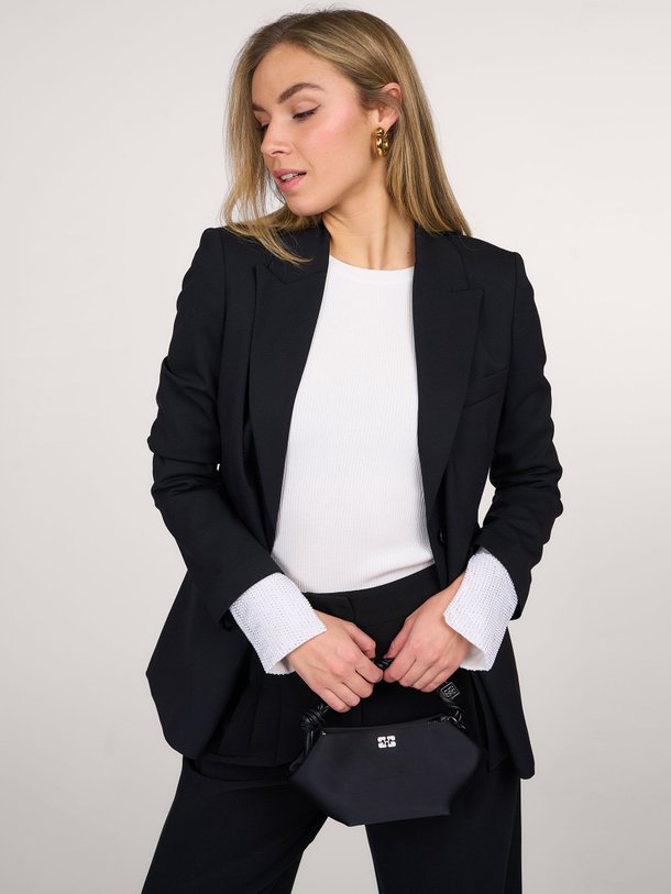 Ontdek de Heborn viscosemix rib top met strass van Essentiel Antwerp in de kleur wit bij Orangebag. Op werkdagen voor 21:45 besteld, morgen in huis.