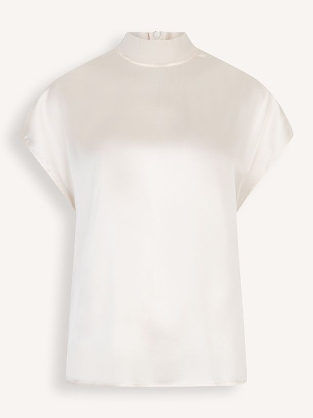 Ontdek de Brisa zijdemix top van Dante 6 in de kleur Crème bij Orangebag. Op werkdagen voor 21:45 besteld, morgen in huis.
