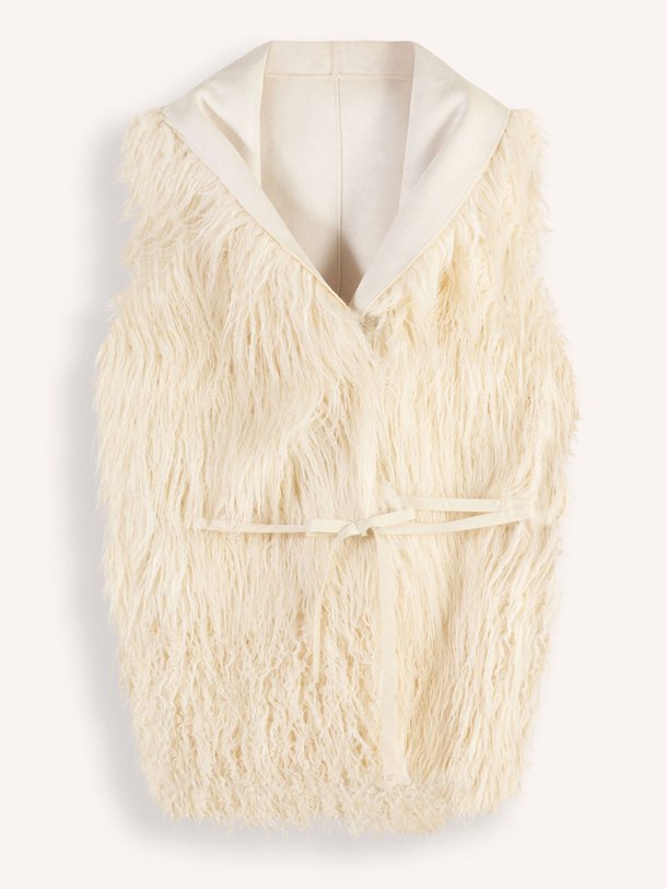 Ontdek de Jaden geweven fake fur reversible gilet van Bellerose in de kleur crème bij Orangebag. Op werkdagen voor 21:45 besteld, morgen in huis.