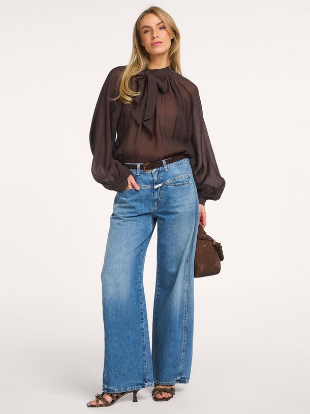 Ontdek de Tilly lyocellmix top met strik van Copenhagen Muse in de kleur Donkerbruin bij Orangebag. Op werkdagen voor 21:45 besteld, morgen in huis.