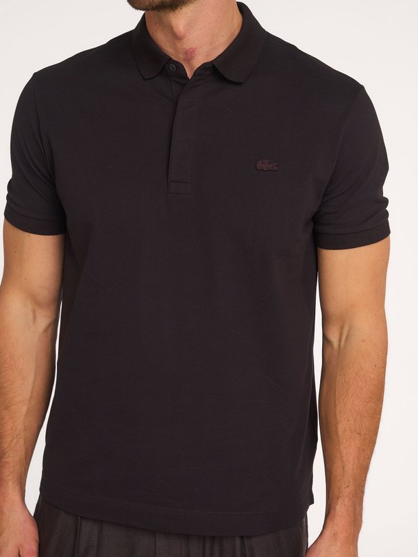 Ontdek de Katoenen logo polo van Lacoste in de kleur Donkerbruin bij Orangebag. Op werkdagen voor 21:45 besteld, morgen in huis.