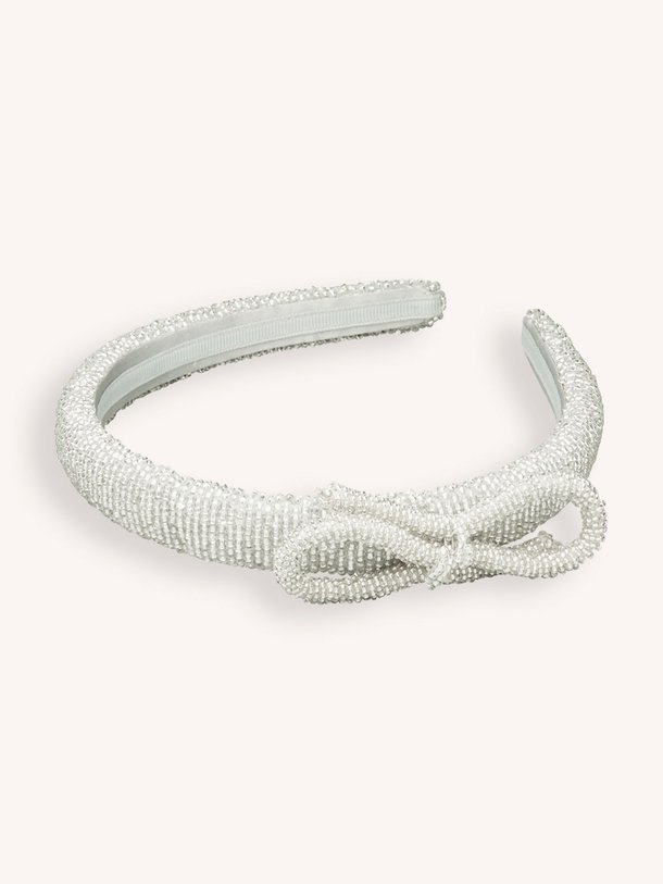 Ontdek de Kralen haarband met strik van Becksondergaard in de kleur zilverkleur bij Orangebag. Op werkdagen voor 21:45 besteld, morgen in huis.