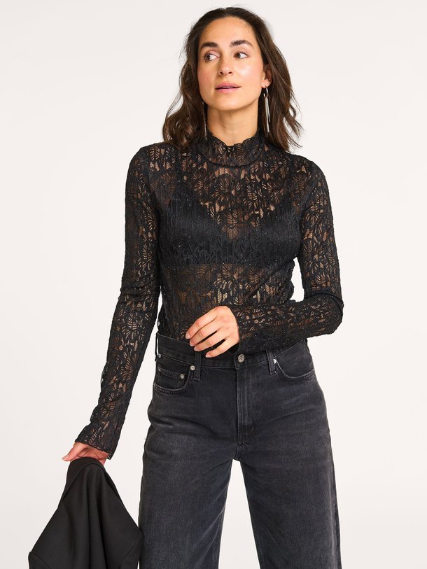 Ontdek de Dunja geweven kanten top met pailletten van Dante 6 in de kleur Zwart bij Orangebag. Op werkdagen voor 21:45 besteld, morgen in huis.