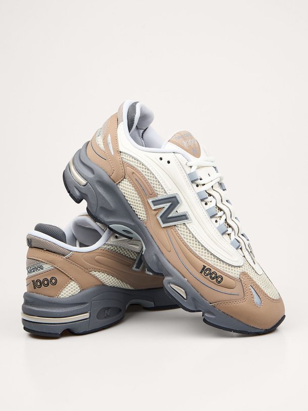 Ontdek de M1000 mesh sneakers van New Balance in de kleur Bruin bij Orangebag. Op werkdagen voor 21:45 besteld, morgen in huis.