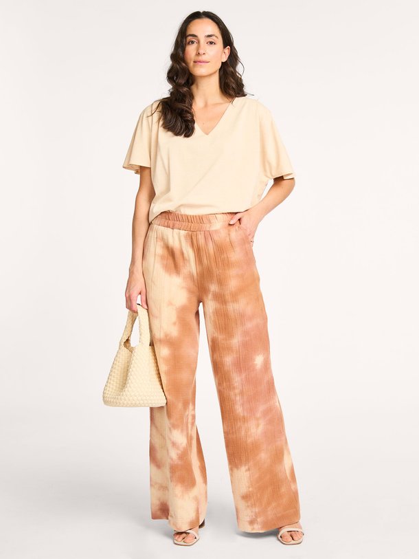 Ontdek de Cylyn katoenen tie dye palazzo van Ruby Tuesday in de kleur terracotta bij Orangebag. Op werkdagen voor 21:45 besteld, morgen in huis.