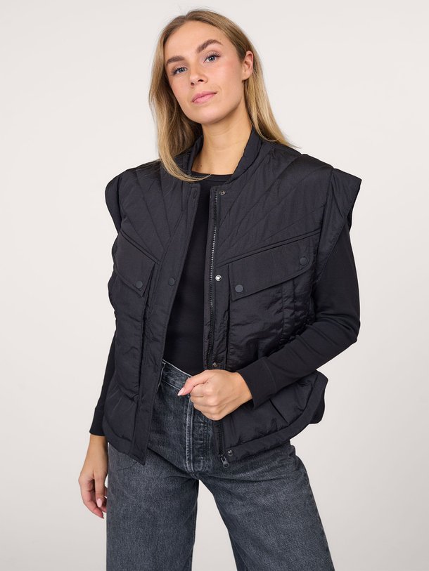 Ontdek de Nisha geweven puffer bodywarmer van Dante 6 in de kleur zwart bij Orangebag. Op werkdagen voor 21:45 besteld, morgen in huis.